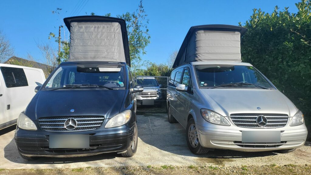 Deux vans Mercedes avec toits relevables ouverts chez Sygma